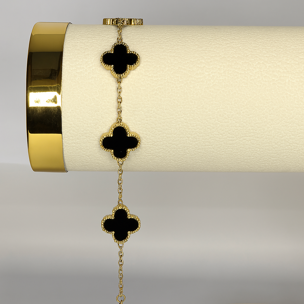 Gold Clover Bracelet with Black Onyx Enamel – Midnight Elegance