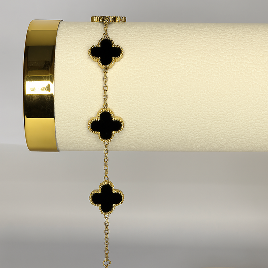 Gold Clover Bracelet with Black Onyx Enamel – Midnight Elegance